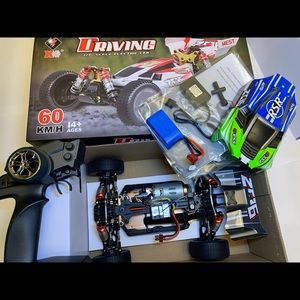 Wltoys 144001 Hobby Grade RC Car! 1500mah Battery, Charger, and Transmitter!